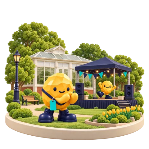 Gold nugget mascot at a small park stage with a low white glasshouse nearby.